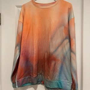 Multi colored jogger sweat suit. Size large. Never worn.